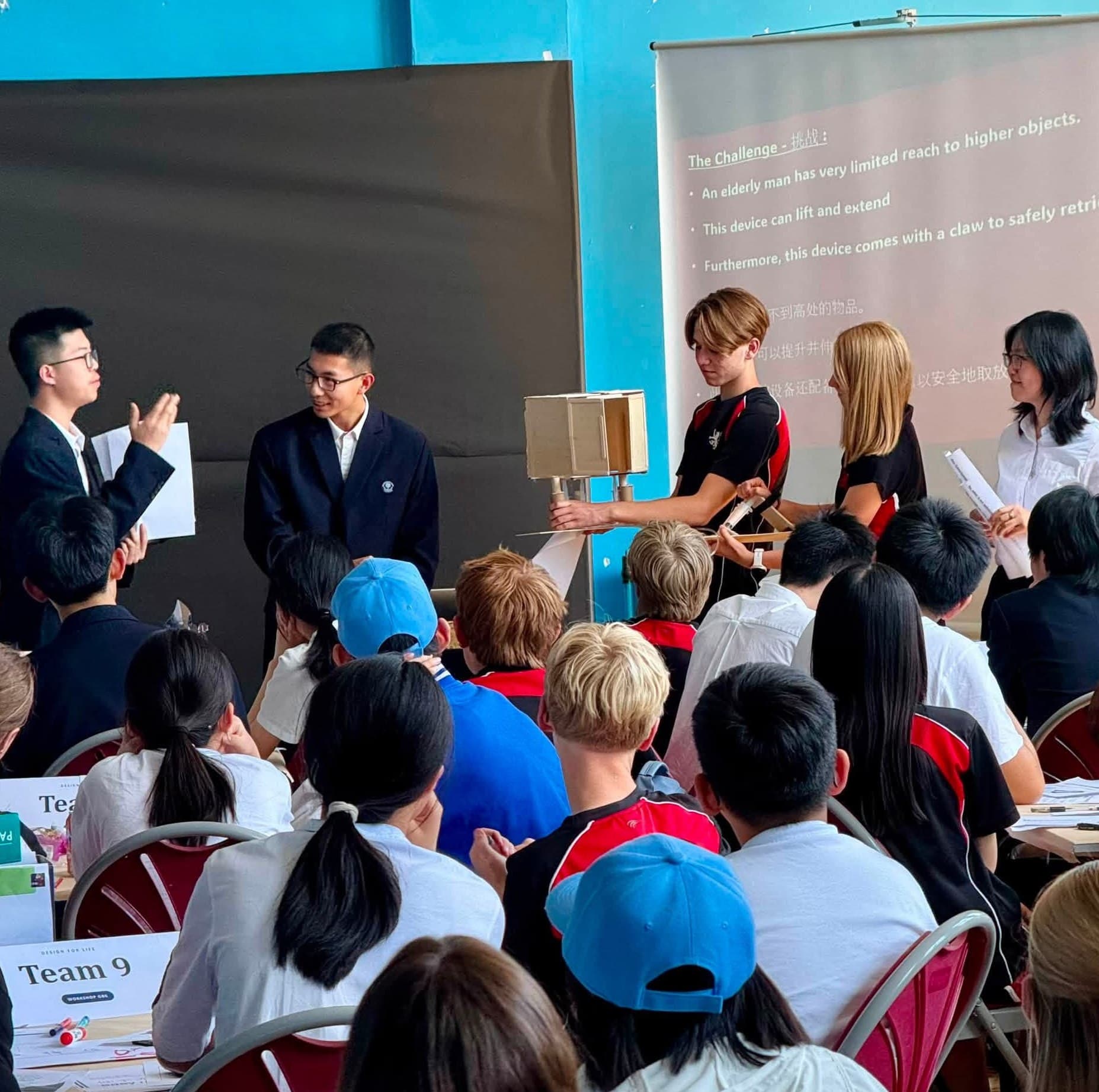 Students presenting and discussing their project work during a CognateUK learning activity.